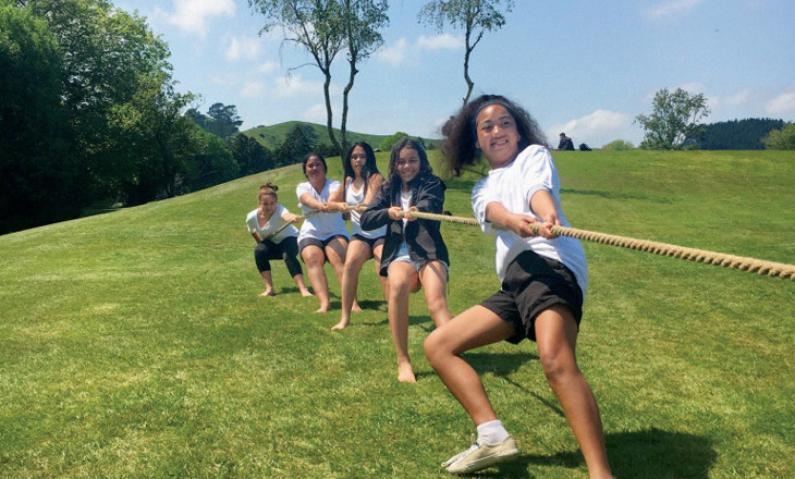 Wahine do battle on a tug-o-war rope