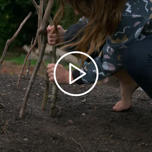 Tamariki playing with sticks