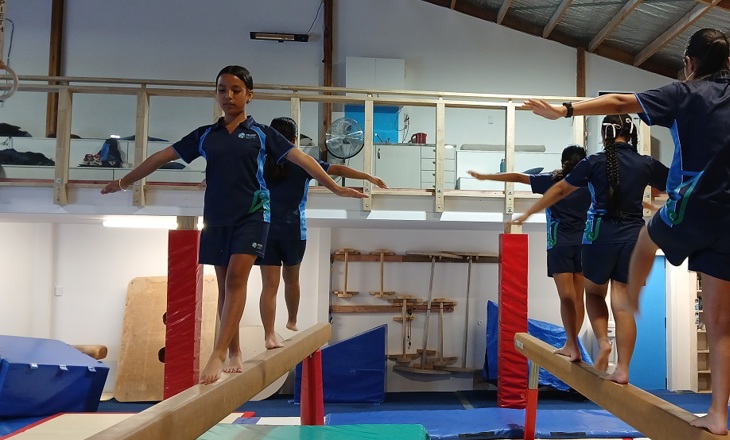 Students on a balance beam