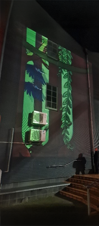 Digital animation of greenery on a building