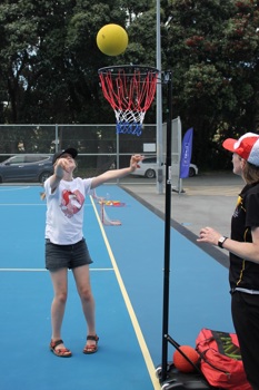 Lucia playing netball at the Wellington centre's 'have a go' ball skills day