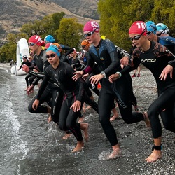 Group readying themselves for an ocean swim race
